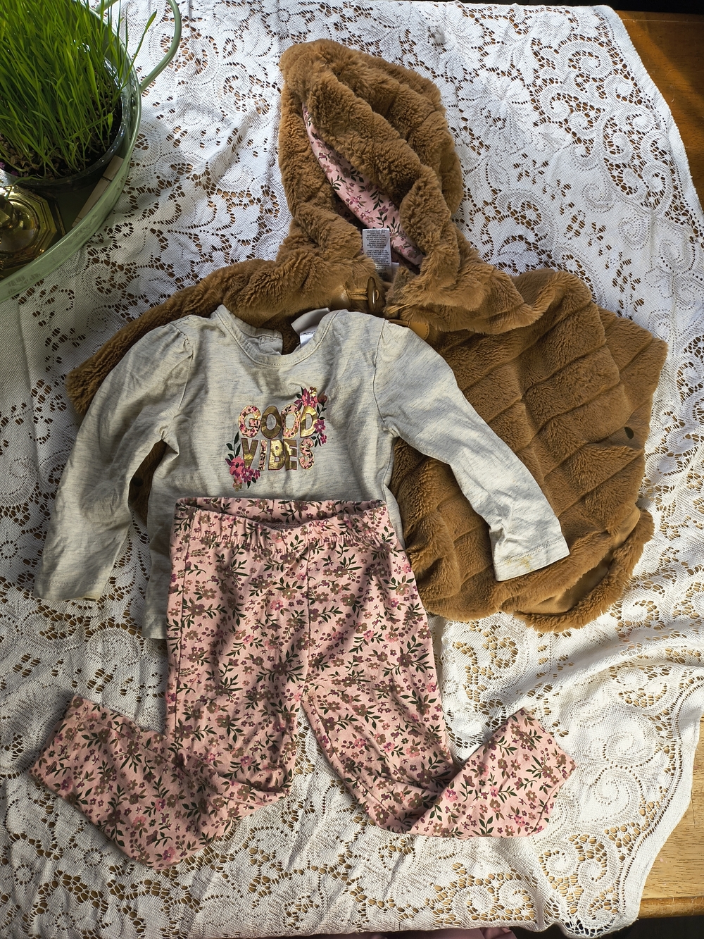 Matching set plush hooded poncho with long sleeve top and pink floral leggings
